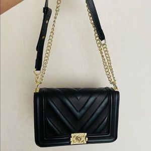 Black Chanel bag.